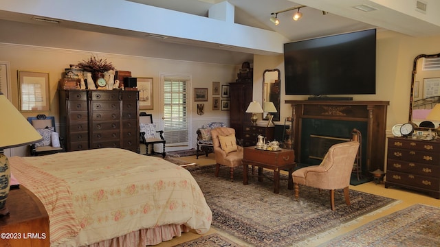 bedroom with vaulted ceiling