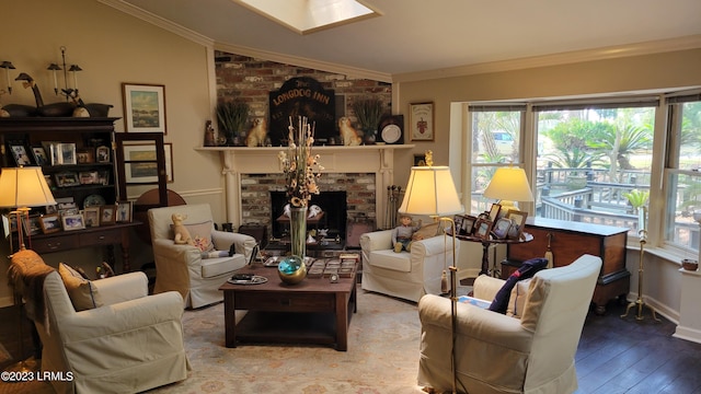 living room featuring hardwood / wood-style flooring, ornamental molding, lofted ceiling, and a fireplace