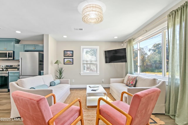 living room featuring light hardwood / wood-style floors