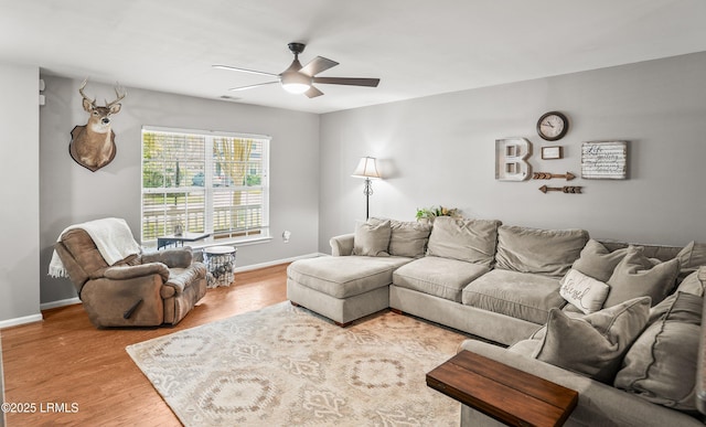 31 Shadow Moss Dr, Beaufort, SC 29906 - living room featuring visible vents, baseboards, a ceiling fan, and wood finished floors