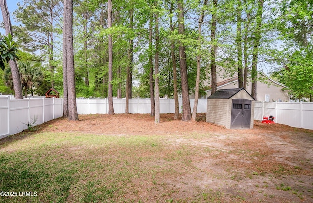 31 Shadow Moss Dr, Beaufort, SC 29906 - view of yard with an outbuilding, a fenced backyard, and a storage unit