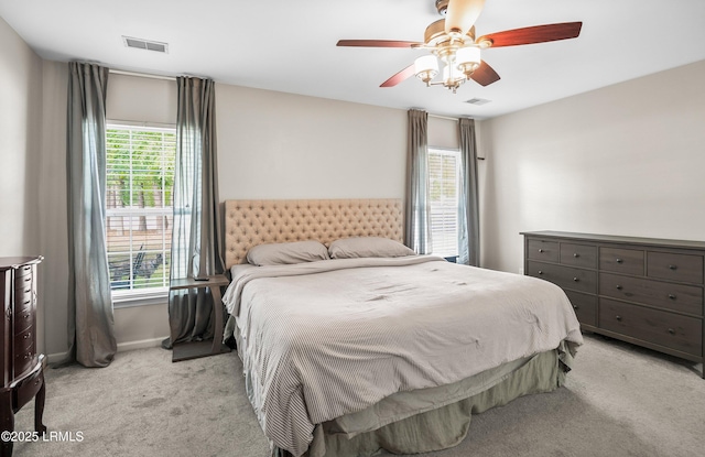 31 Shadow Moss Dr, Beaufort, SC 29906 - bedroom featuring visible vents, baseboards, a ceiling fan, and light carpet