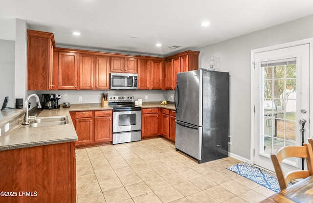 31 Shadow Moss Dr, Beaufort, SC 29906 - kitchen featuring a sink, recessed lighting, light tile patterned flooring, and stainless steel appliances