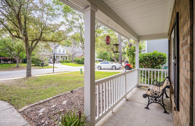31 Shadow Moss Dr, Beaufort, SC 29906 - view of patio / terrace with a porch and a residential view