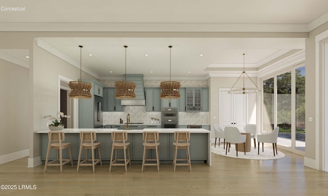 kitchen with a kitchen bar, backsplash, stainless steel appliances, and light countertops