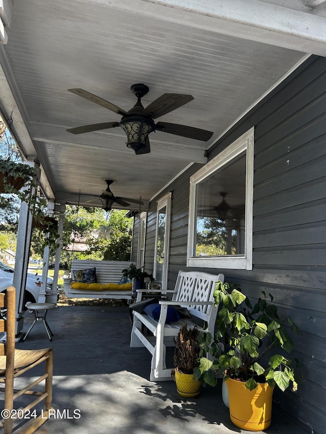 view of patio / terrace featuring a porch and ceiling fan