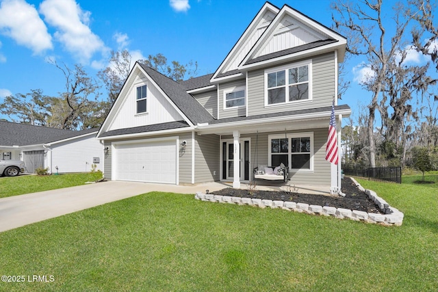 view of front of property with covered porch, board and batten siding, concrete driveway, and a front lawn