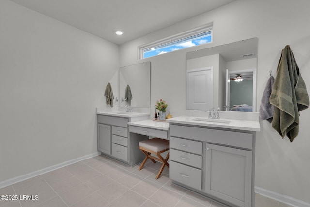 full bath with baseboards, ensuite bathroom, visible vents, and vanity