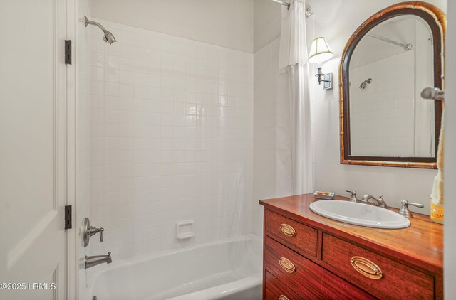 bathroom with vanity and shower / bath combination with curtain