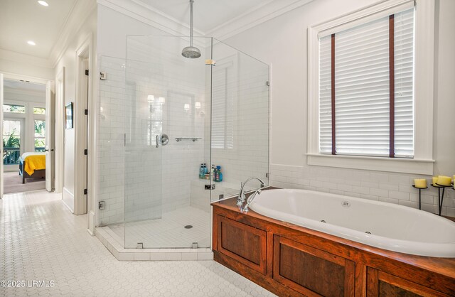 bathroom featuring crown molding and plus walk in shower