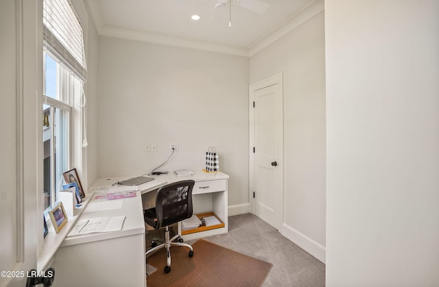 carpeted office featuring crown molding