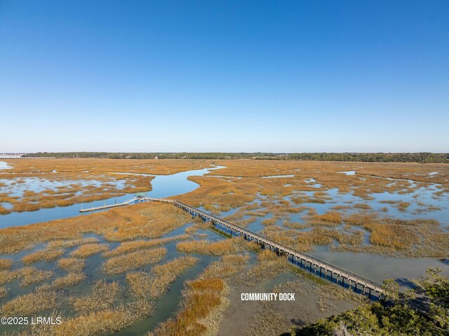 aerial view featuring a water view and a rural view