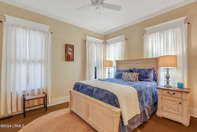 bedroom with ornamental molding and ceiling fan