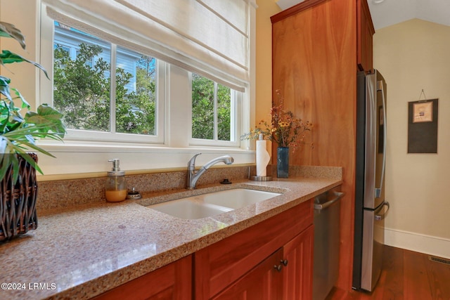 bathroom with wood-type flooring and vanity