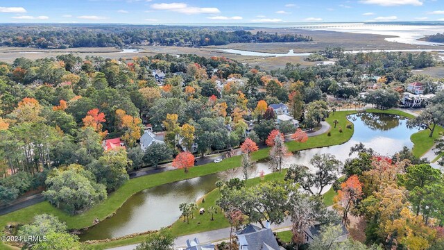 birds eye view of property featuring a water view