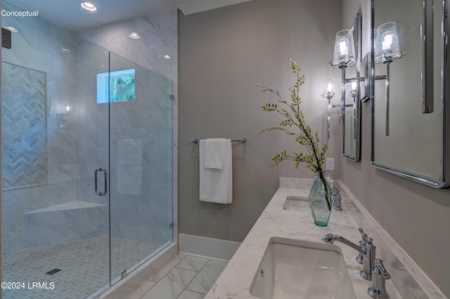 bathroom with vanity and a shower with shower door