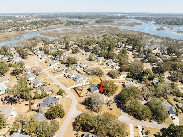 birds eye view of property featuring a residential view and a water view