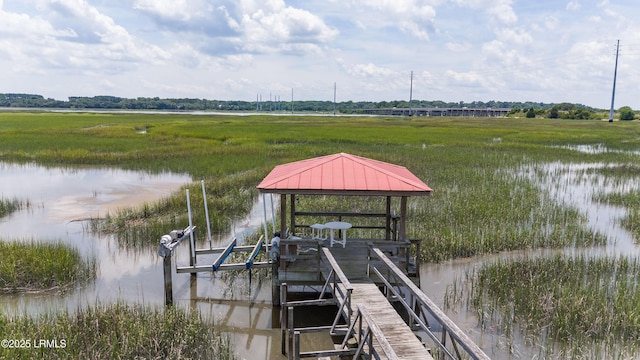 view of dock with a water view and boat lift