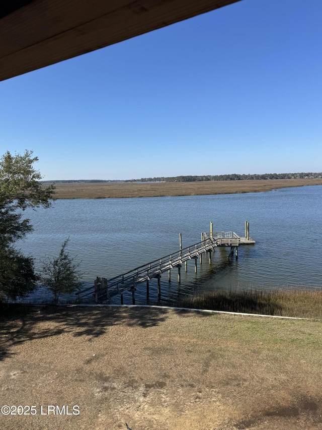 view of dock with a water view