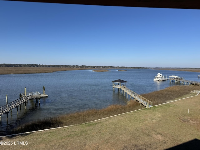 dock area featuring a water view