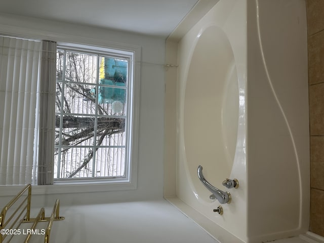 bathroom with a bathing tub