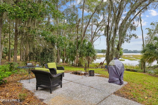 view of patio / terrace with a water view