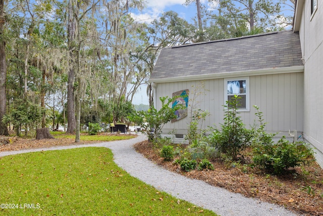 exterior space with a yard