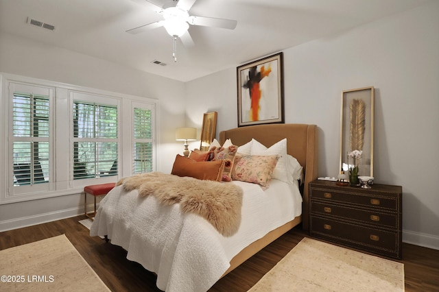 17 Marlowe Way Unit 1, Bluffton, SC 29910 - bedroom with baseboards, dark wood-type flooring, and a ceiling fan