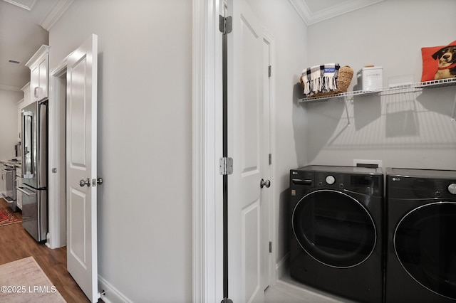 17 Marlowe Way Unit 1, Bluffton, SC 29910 - washroom featuring separate washer and dryer, ornamental molding, and dark wood-style flooring