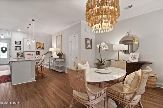 17 Marlowe Way Unit 1, Bluffton, SC 29910 - dining room featuring ornamental molding, dark wood-style floors, baseboards, and recessed lighting