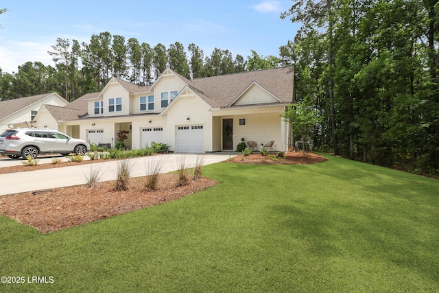 17 Marlowe Way Unit 1, Bluffton, SC 29910 - view of front of house featuring concrete driveway, a front yard, and a garage