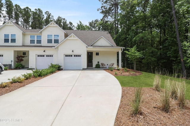 17 Marlowe Way Unit 1, Bluffton, SC 29910 - view of front facade featuring concrete driveway and a shingled roof