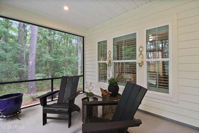 17 Marlowe Way Unit 1, Bluffton, SC 29910 - sunroom / solarium featuring wooden walls, carpet flooring, and recessed lighting