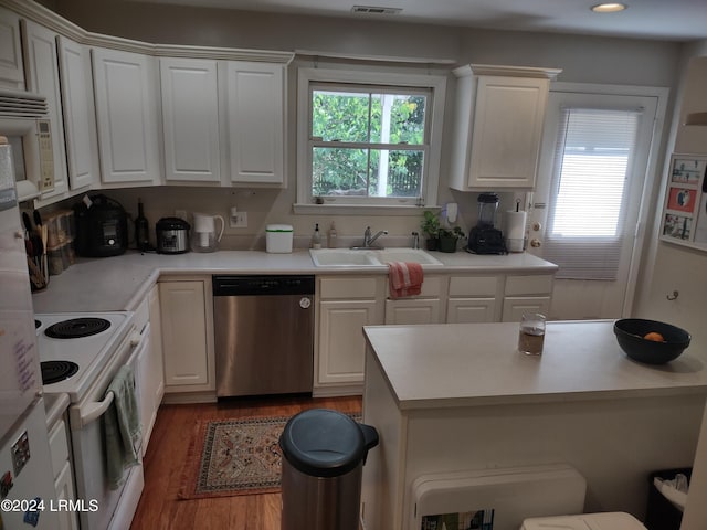 kitchen with white cabinetry, white electric range, sink, and stainless steel dishwasher