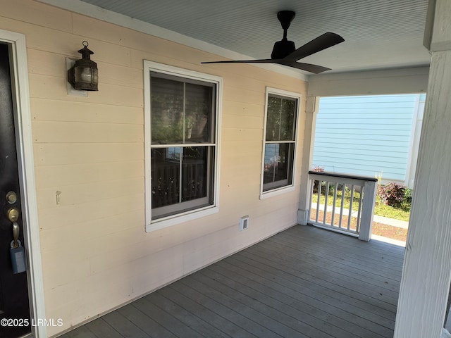 1317 Broad St, Beaufort, SC 29902 - wooden terrace featuring covered porch and a ceiling fan