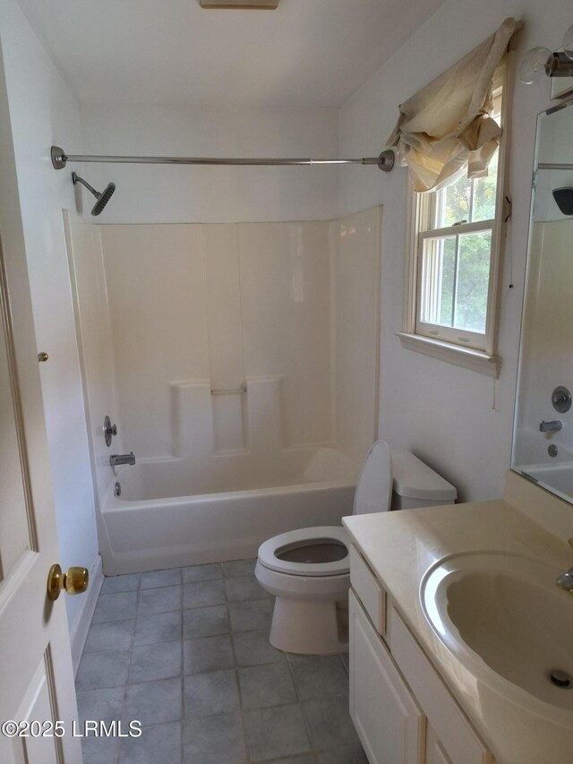 1317 Broad St, Beaufort, SC 29902 - full bath featuring vanity, toilet, shower / bathtub combination, and tile patterned flooring