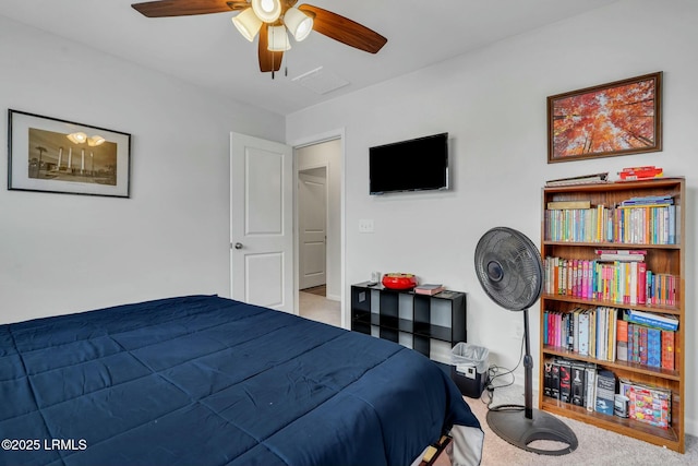 bedroom featuring light carpet and ceiling fan