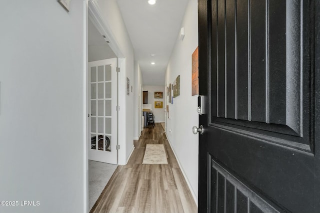 doorway to outside featuring hardwood / wood-style flooring