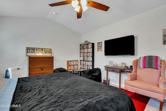 bedroom with lofted ceiling and ceiling fan