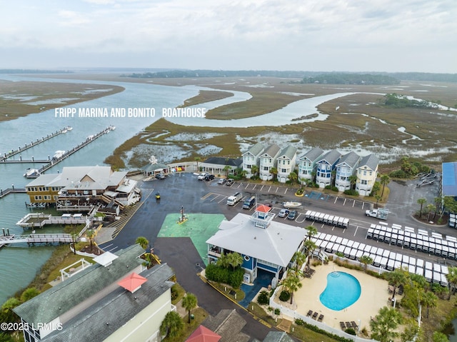 aerial view with a water view and a residential view