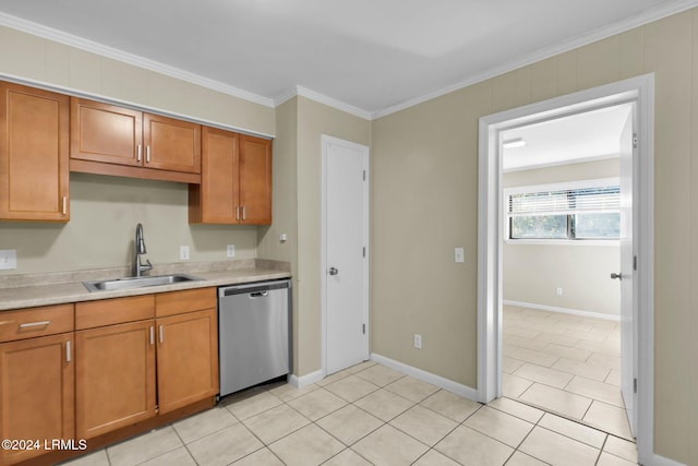 kitchen with light tile patterned flooring, ornamental molding, dishwasher, and sink