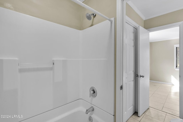 bathroom featuring ornamental molding, tile patterned floors, and shower / bathing tub combination