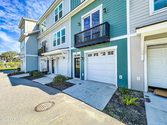 view of front of property with a garage