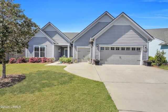 view of front of home featuring concrete driveway, an attached garage, and a front yard