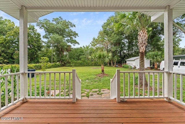 deck featuring a yard