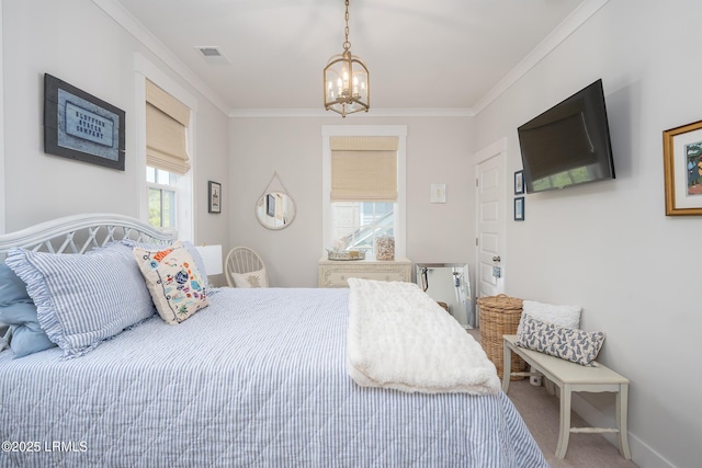 carpeted bedroom with a chandelier, visible vents, baseboards, and ornamental molding