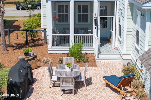 view of patio / terrace with fence
