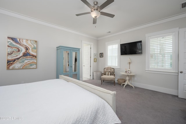 bedroom featuring carpet floors, crown molding, visible vents, baseboards, and ceiling fan