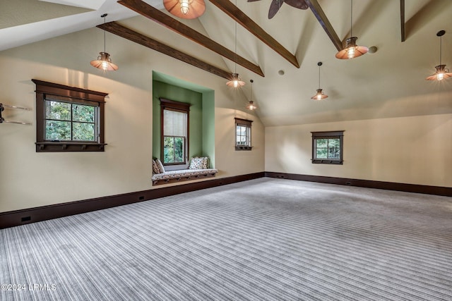 spare room with ceiling fan, carpet floors, high vaulted ceiling, and a healthy amount of sunlight