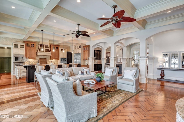 living room with coffered ceiling, beam ceiling, and light parquet floors